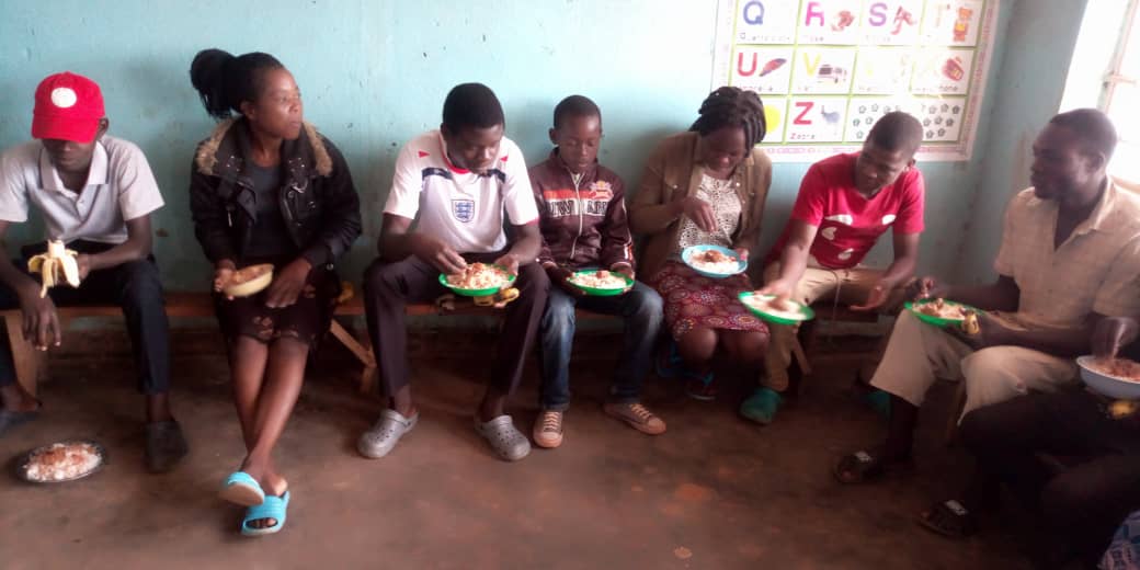 Youth Having a Meal